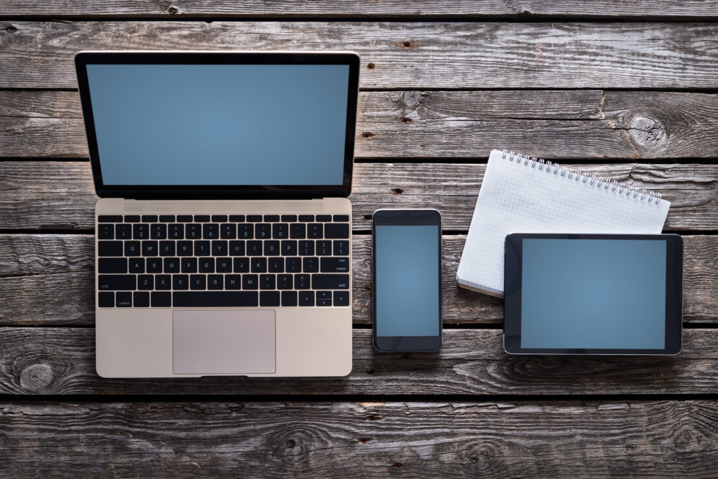 laptop, phone, and tablet for using coaches central